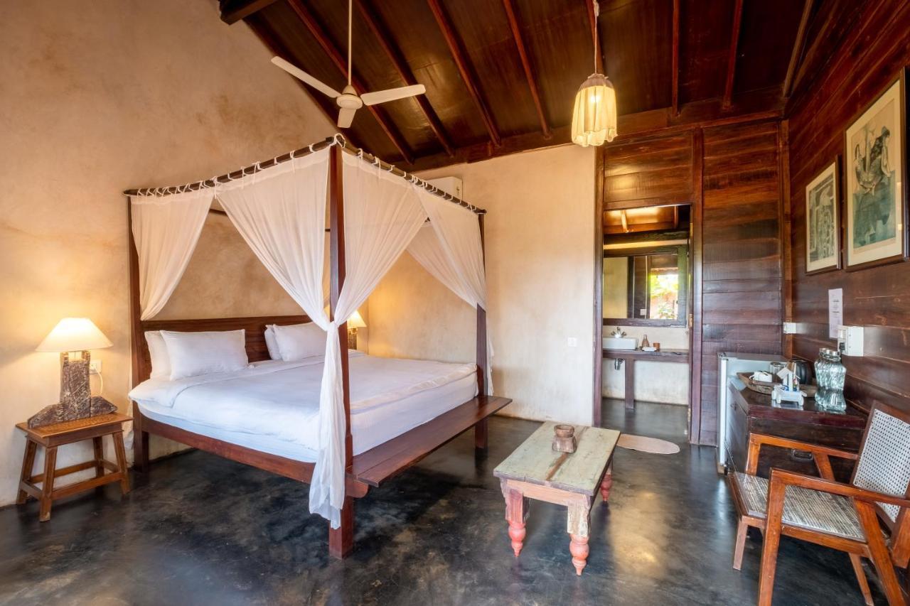 The Artist Cottages Morjim Bagian luar foto