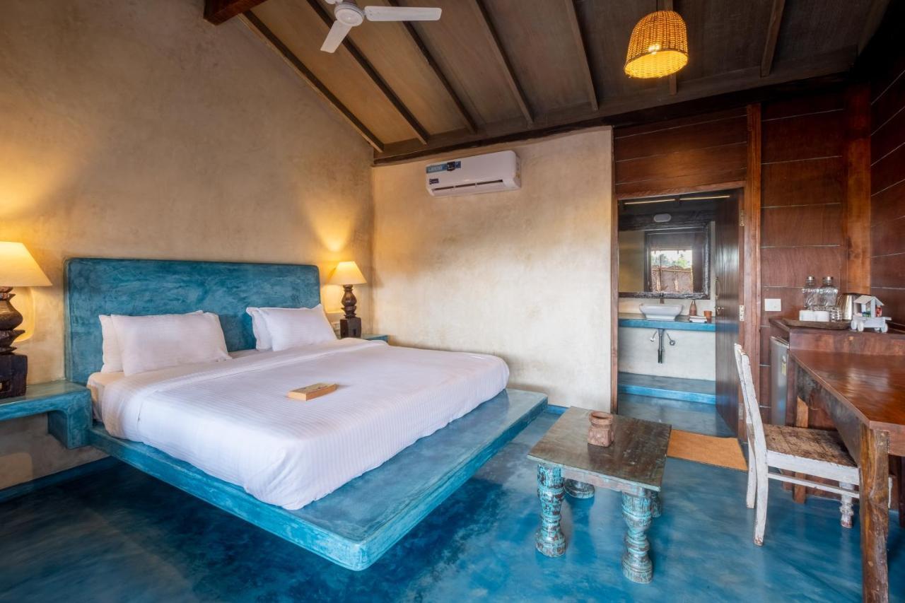 The Artist Cottages Morjim Bagian luar foto