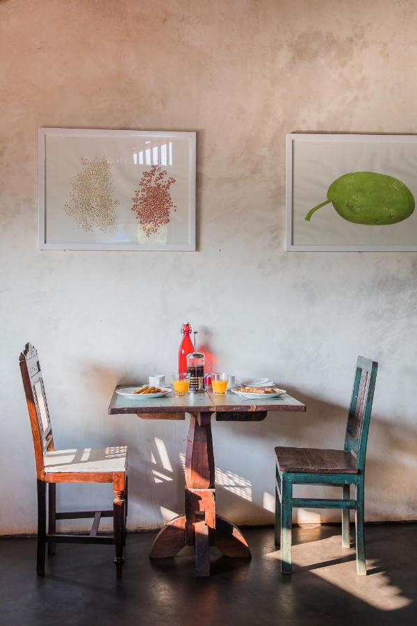 The Artist Cottages Morjim Bagian luar foto