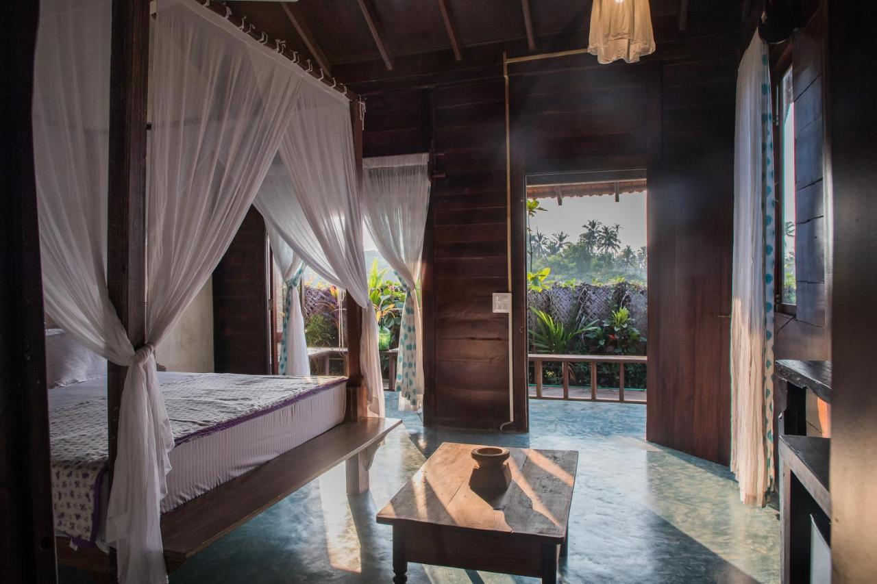The Artist Cottages Morjim Bagian luar foto